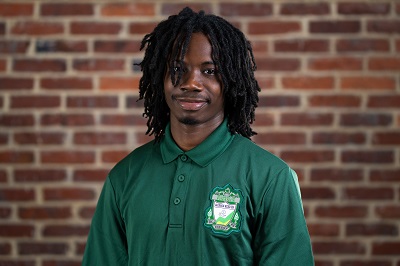 Aya Shaw, a Black young man, who is a senior at Jackson Reed